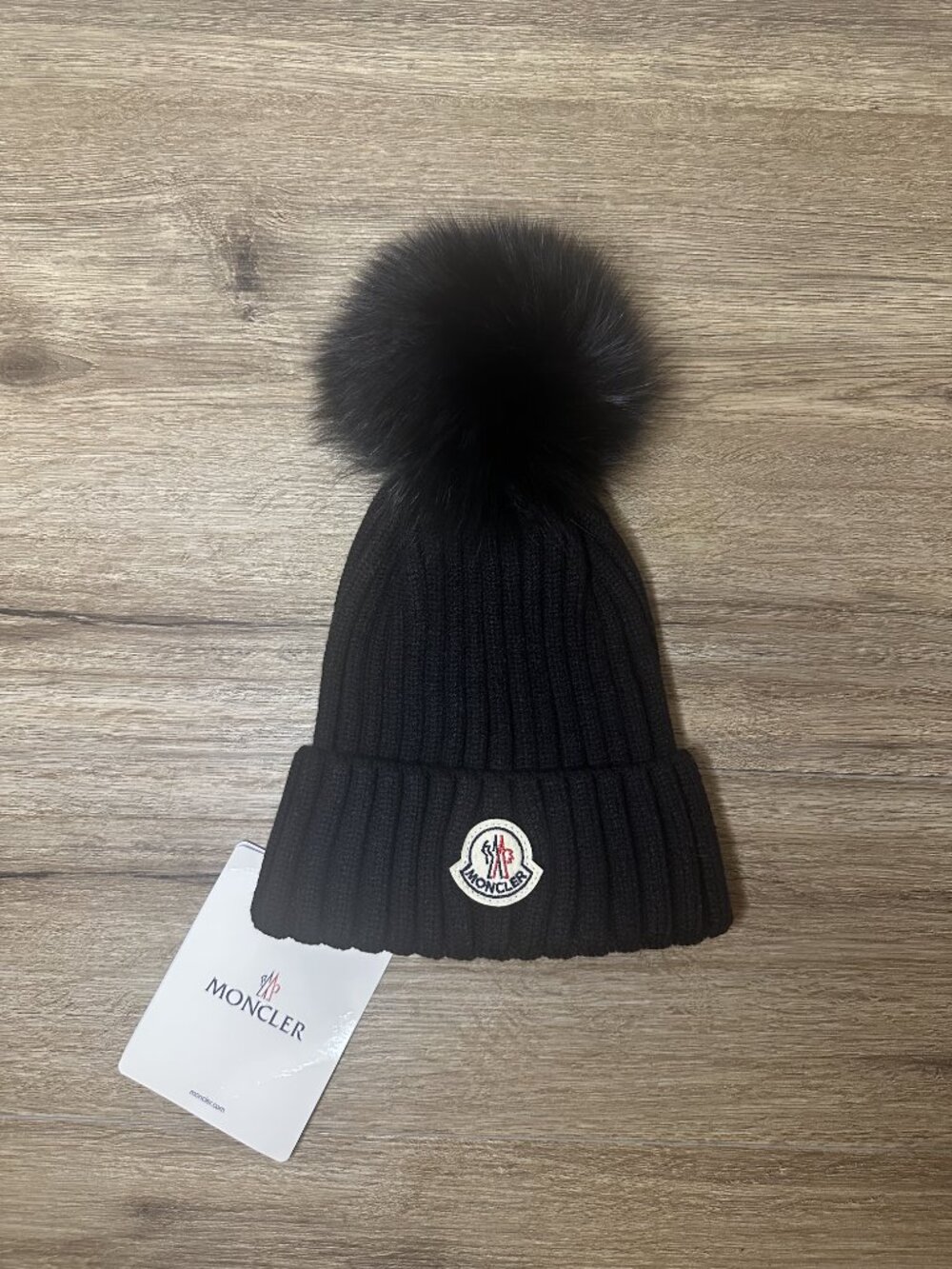 Moncler Black Beanie with Faux Fur Pom Pom
